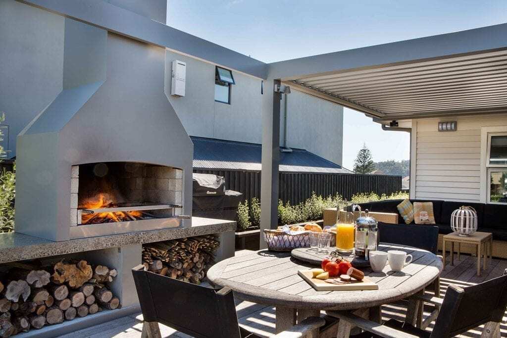Dine while enjoying the warmth of an outdoor fire