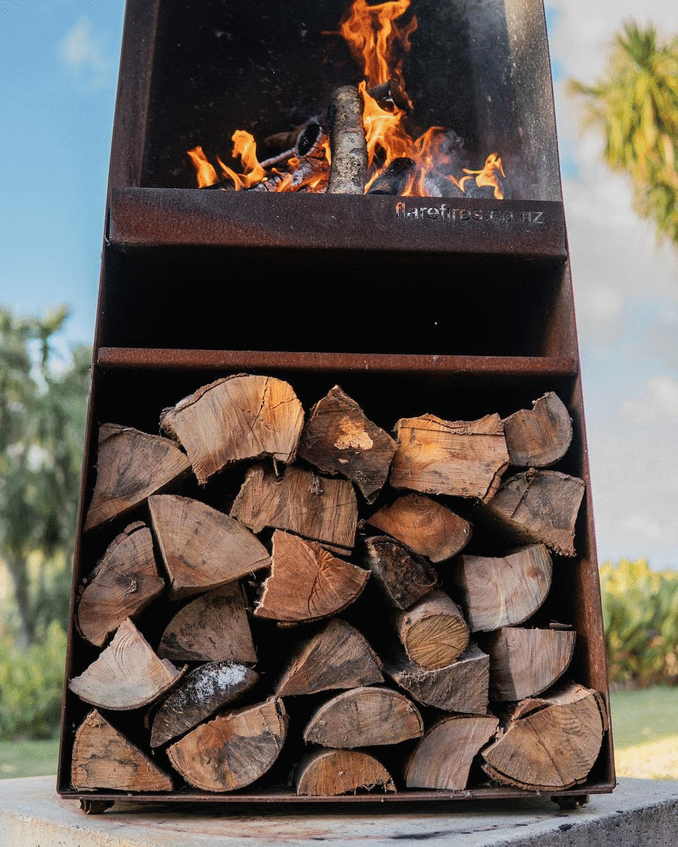 Wood burning on a Flare Martello Outdoor fireplace