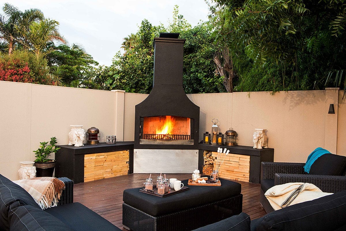 A beautiful entertainment area with a stunning Outdoor Fire