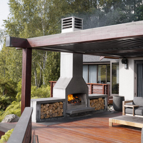 Charcoal outdoor fireplace under a timber pergola on a deck, seen from the living room doors