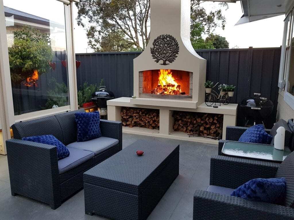 A stunning backyard place with a beautiful outdoor fire to hangout with friends or family